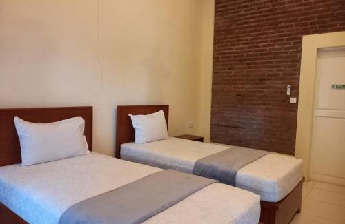 Muncar Hostel | Budget-Friendly TelukBiru Homestay with Family Amenities
