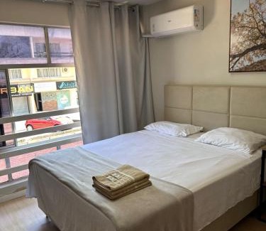 Sudoeste e Octogonal Apartment | Cozy Kit Studio Ipê Branco - Perfect for Families & Pets