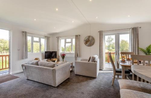 Welney House | Discover Tench Lodge: Family & Pet Friendly Retreat