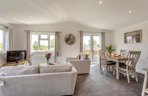 Welney House | Discover Tench Lodge: Family & Pet Friendly Retreat