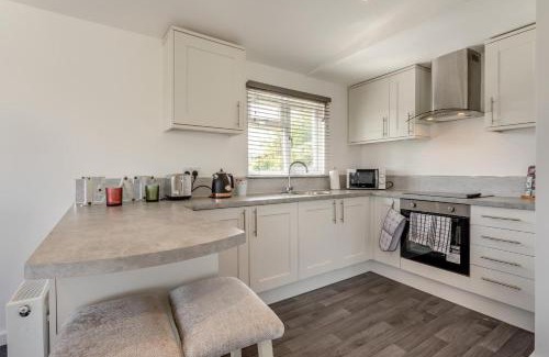 Welney House | Discover Tench Lodge: Family & Pet Friendly Retreat