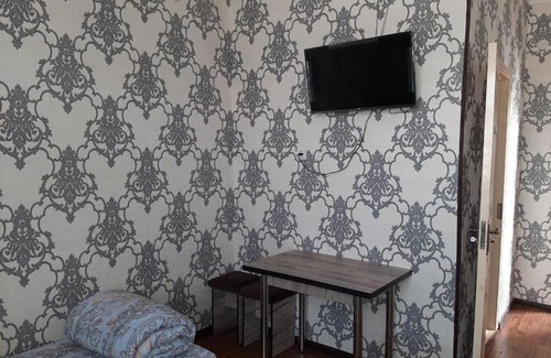 Muynak Apartment | Pet-Friendly Comfort at Teniz Hotel for Your Family Stay