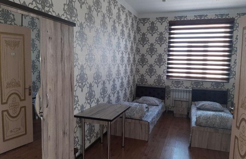 Muynak Apartment | Pet-Friendly Comfort at Teniz Hotel for Your Family Stay