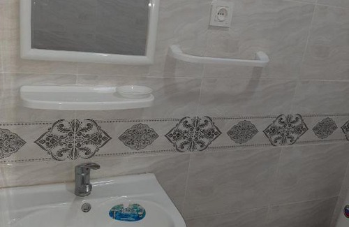Muynak Apartment | Pet-Friendly Comfort at Teniz Hotel for Your Family Stay