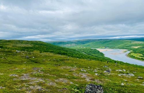 Utsjoki Villa | Riverfront Escape at Teno Charm - Beachside Cottage Retreat