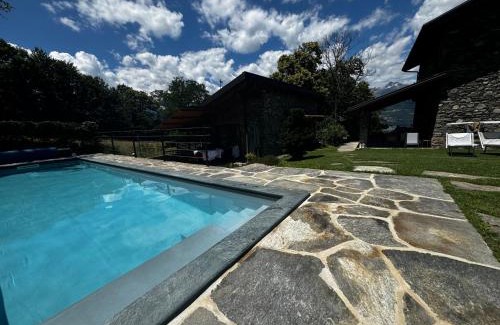 Colico Ski Chalet | Relaxing Tenuta Pozzi: Oceanfront Retreat with Pool & Pets