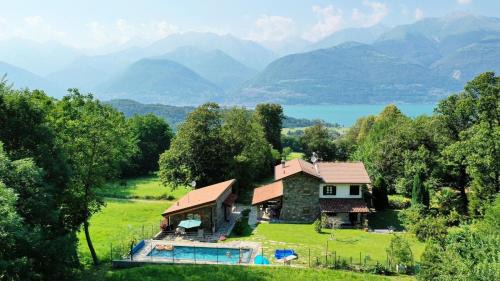 Colico Ski Chalet | Relaxing Tenuta Pozzi: Oceanfront Retreat with Pool & Pets