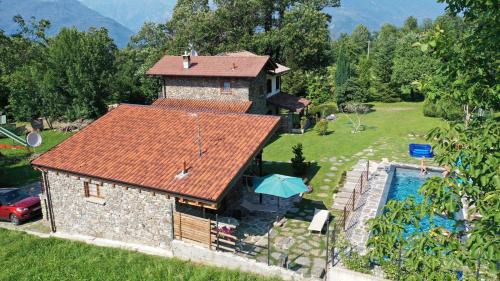 Colico Ski Chalet | Relaxing Tenuta Pozzi: Oceanfront Retreat with Pool & Pets