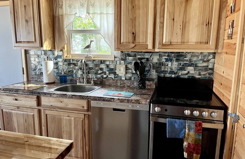 Alpena Cottage | Beautiful Tequila Sunrise Beachfront Cottage with Ocean View