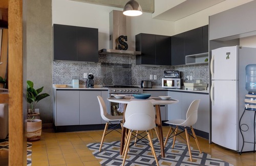 Americana Apartment | Experience Tequiloft: Your Urban Oasis with Spa & Kitchen