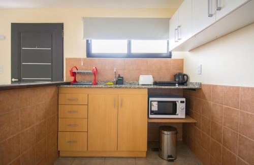 Macrozona Meseta Cerro Calafate Apartment | Pet-Friendly Apart Austral: Family Retreat with Great Reviews