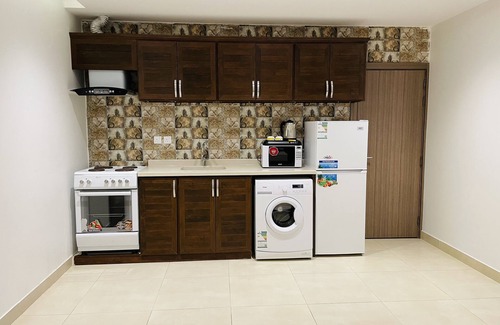 Al Aqrabiyah Apartment | Terrace View 2: Top-Rated Hotel Apartments with Spa & Kitchen