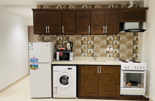 Al Aqrabiyah Apartment | Terrace View 2: Top-Rated Hotel Apartments with Spa & Kitchen
