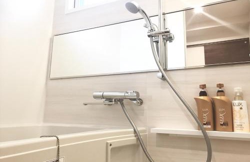 Tomigusuku Apartment | Child-Friendly Getaway at TerraceRin YN23 - Guest Rated 9.8
