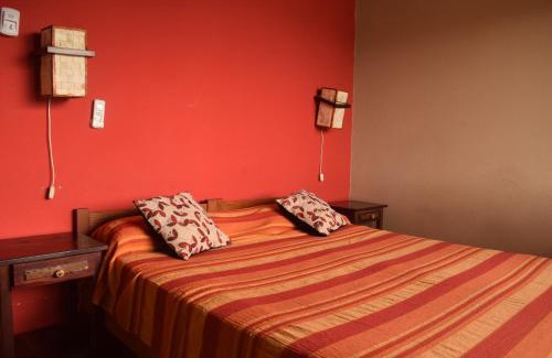 Coronel Moldes Hotel | Relax at Terrazas Del Lago: Poolside Oceanfront Retreat