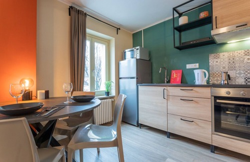Borgo Dora Apartment | Relax at Terrazza Borgo Dora with Family-Friendly Amenities