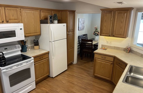 Lawrence House | Ideal Townhome with Private Yard and Family-Friendly Amenities