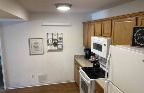 Lawrence House | Ideal Townhome with Private Yard and Family-Friendly Amenities