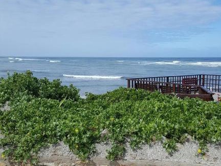 West Bank Bed & Breakfast | Pet-Friendly Tertia's Logcabin with Ocean Views & Breakfast