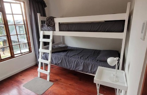 Wilderness House | Pet-Friendly Haven: Family Welcoming at Test Property