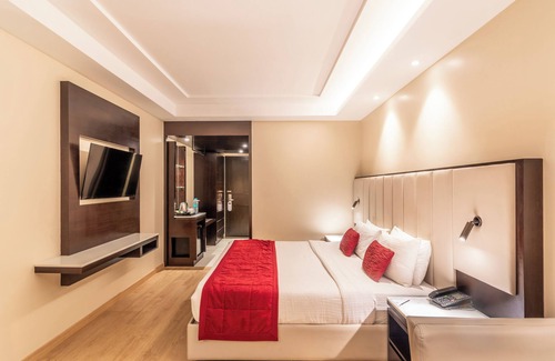 Hosur Hotel | Comfortable Stay at TGI Grand Fortuna with Pool & Dining