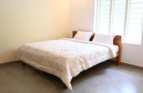 Vythiri House | Discover Thalamala Vythiri: Family-Friendly Retreat with Breakfast