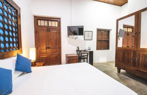 Jaffna Hotel | Discover Thambu Illam: Family-Friendly with Pool & Dining