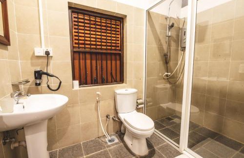 Jaffna Hotel | Discover Thambu Illam: Family-Friendly with Pool & Dining