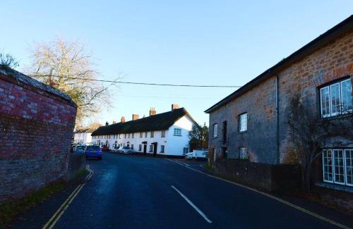 Otterton House | Charming Thatched Cottage in Picturesque Village by Sea