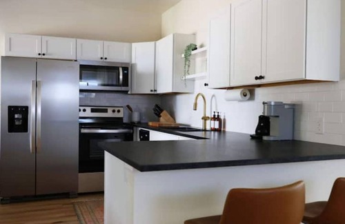 Cheyenne House | Modern Downtown Private Home with Fenced Backyard & Spa