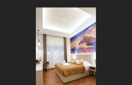 Klojen Hotel | Discover The Aliante Hotel: Family-Friendly Stay with Pool