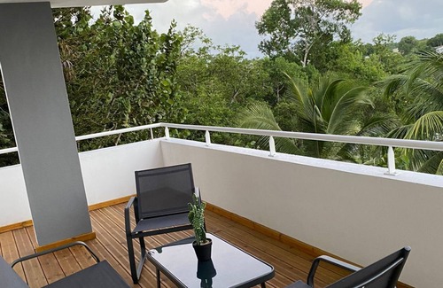 Les Abymes Apartment | Oceanfront Apartment with Pool & 10/10 Review Score