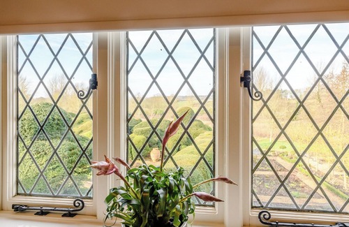 Swannington Cottage | Explore Norwich and the Broads from a Cozy Lakeside Retreat
