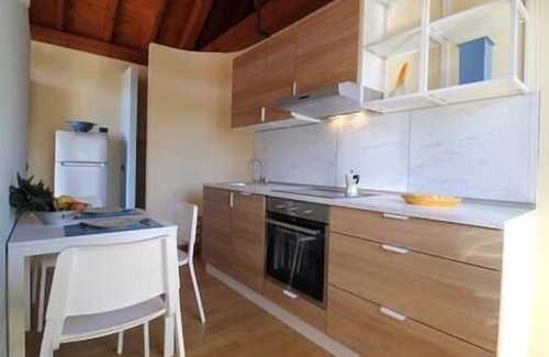 Pettenasco Apartment | Experience The Arch: Serene Lake Views and Garden Retreat