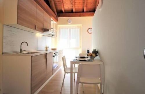 Pettenasco Apartment | Experience The Arch: Serene Lake Views and Garden Retreat