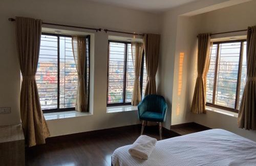 Ballygunge Bed & Breakfast | Cozy Aster Penthouse: Pet & Child Friendly Retreat