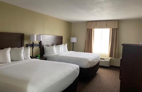 Quincy Hotel | Inviting Atrium Hotel on Third: Pool & Family-Friendly Stay