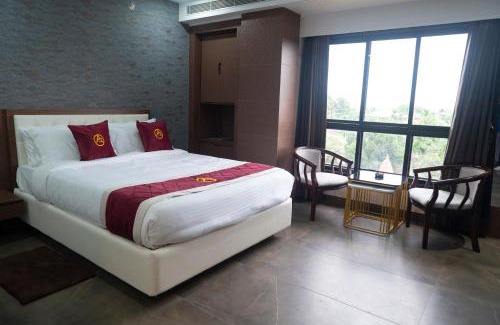 Siliguri Hotel | Discover The Autograph Inn: Oceanfront Retreat with Pool