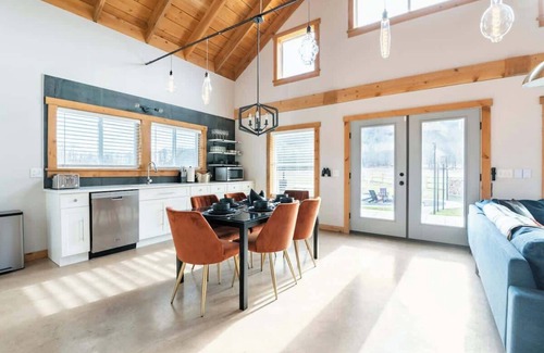 Caroline House | Experience The Barn: Cozy Chalet with Hot Tub & Campfire