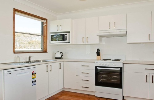 Culburra Beach Cottage | Pet-Friendly Retreat at The Batch with Pool and Kitchen