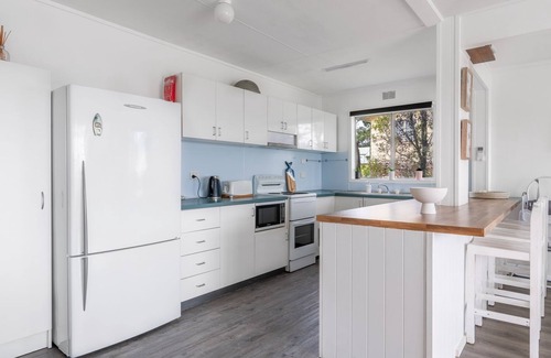 Manyana House | Family-Friendly Beach Box: Oceanfront Getaway Awaits