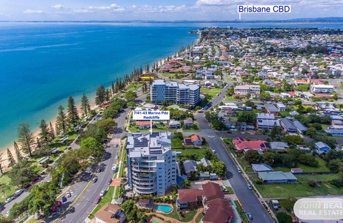 Redcliffe Apartment | Beachouse Retreat: Family-Friendly with Pool Access