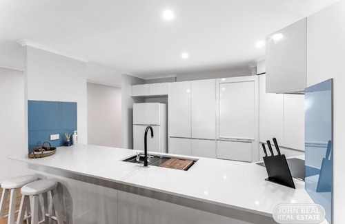 Redcliffe Apartment | Beachouse Retreat: Family-Friendly with Pool Access