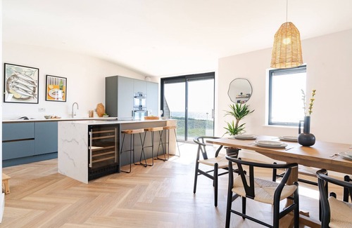 Widemouth Bay House | The Beacon is a five bedroomed terraced seafront retreat with incredible views of Widemouth Bay. It