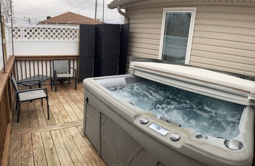 Aurora House | Relax at The Bear Cave with Hot Tub in Aurora Village