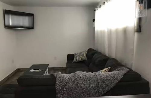 Aurora House | Relax at The Bear Cave with Hot Tub in Aurora Village