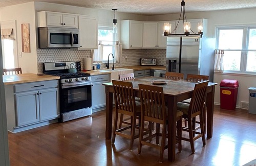 Beech Grove House | Discover The Bedford: Cozy Retreat with Pool & Ocean Views