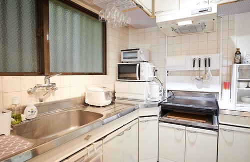 Maejima Apartment | Family-Friendly Stay with Futon Bedrooms in Naha, Okinawa