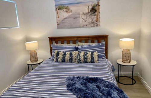 Broadwater Ski Chalet | Cozy Beach Cabin with Ocean Views and Pool Access