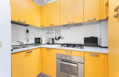 Rione XIV Borgo Apartment | Unmatched Views of St. Peter's Dome with Family-Friendly Amenities